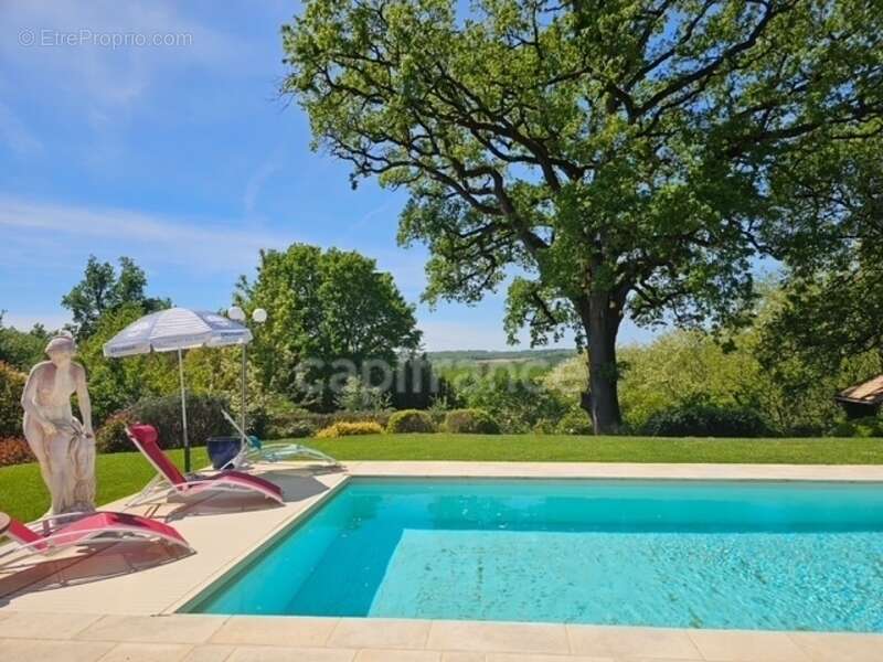 Villa de plain pied - 4 chambres - piscine - terrain de pétanque - garage - cadre naturel privilégié - photo 2