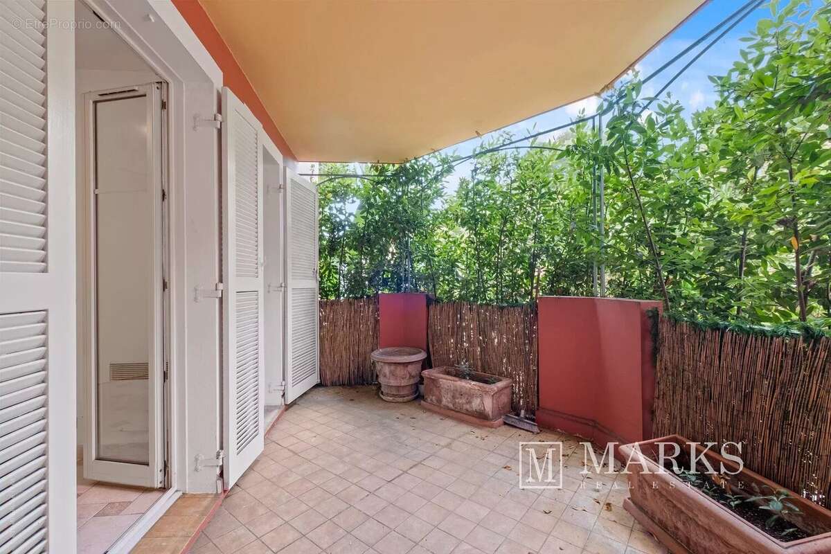 Appartement de 2 chambres avec terrasse, jardin et garage - photo 18