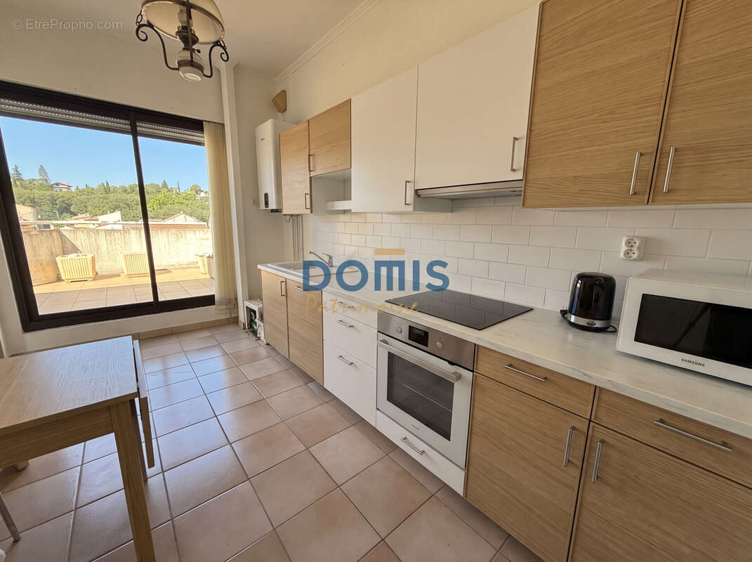 Nimes cadereau appt de type 4  dernier etage avec terrasse et garage  en exclusivite - photo 3