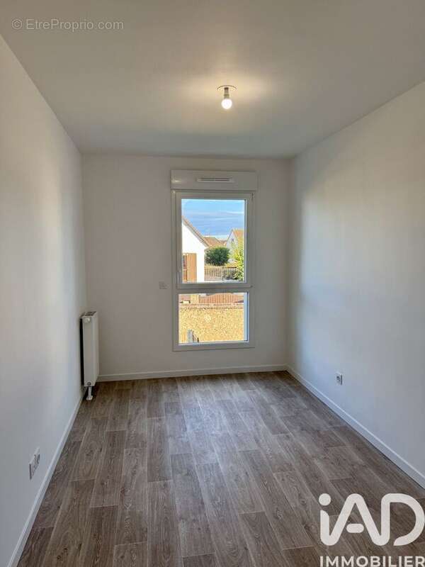 Photo 9 - Appartement à CORMELLES-LE-ROYAL