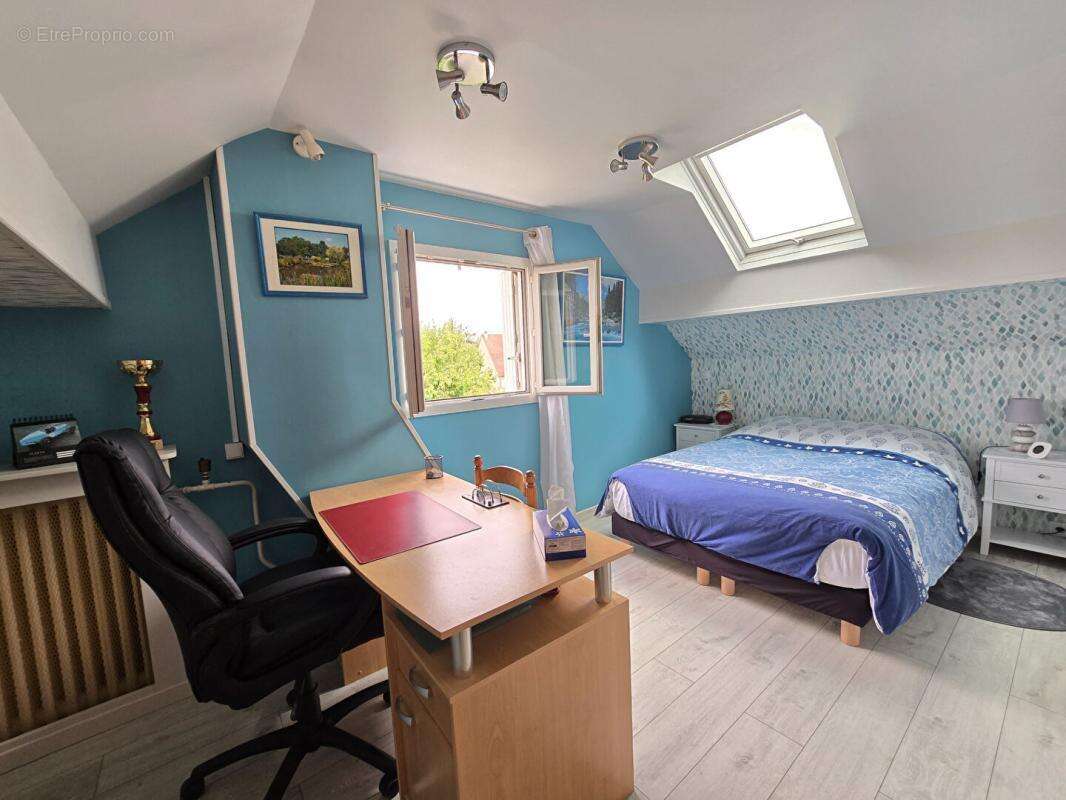 Maison individuelle avec 4 chambres, véranda et magnifique jardin - 175 M2 utiles - photo 11