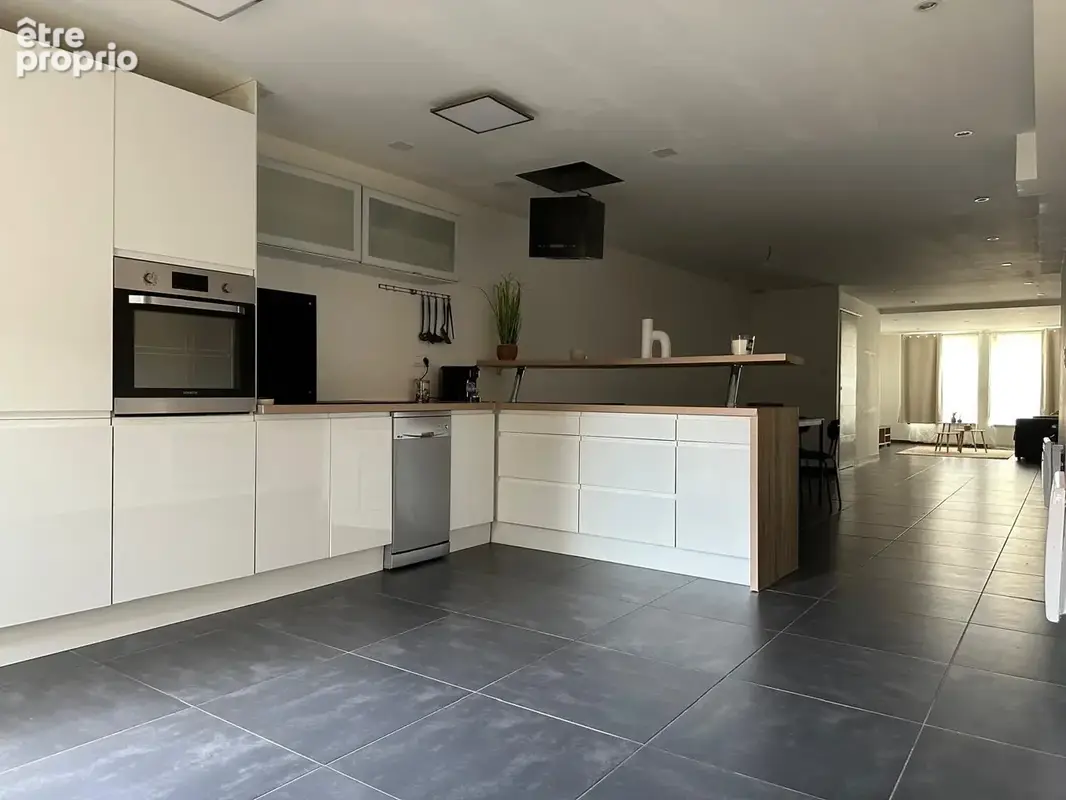 immeuble de rapport avec un logement 121 m2 et 3 cellules commerciales - photo 4