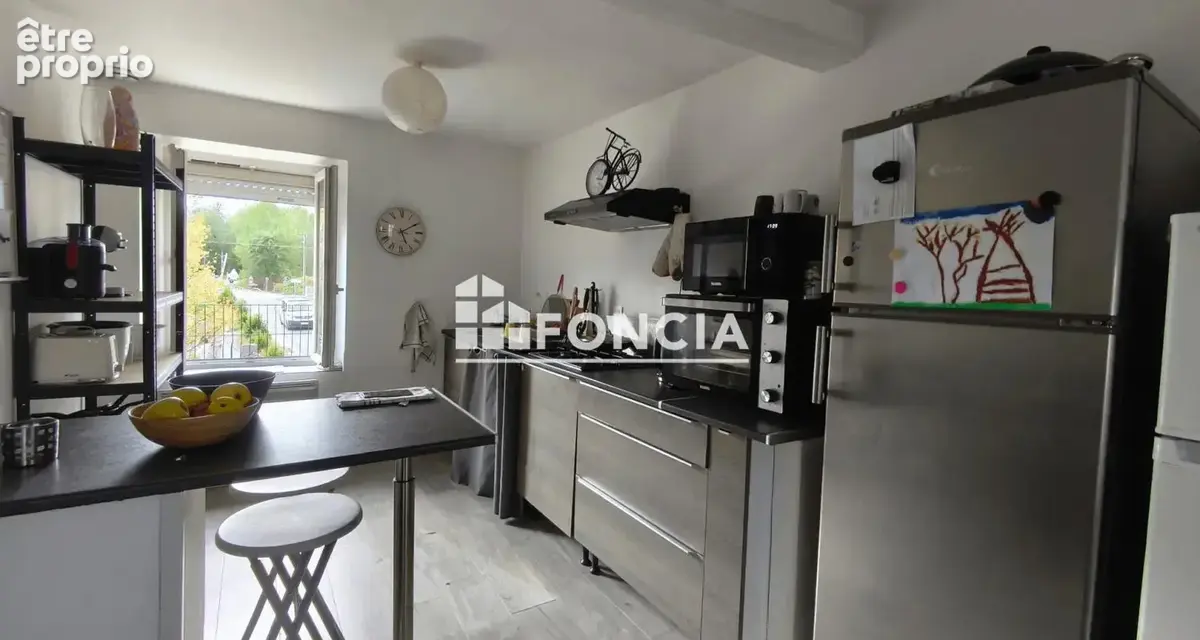 Immeuble de 2 appartements et une maison en centre ville de Dordives - photo 10