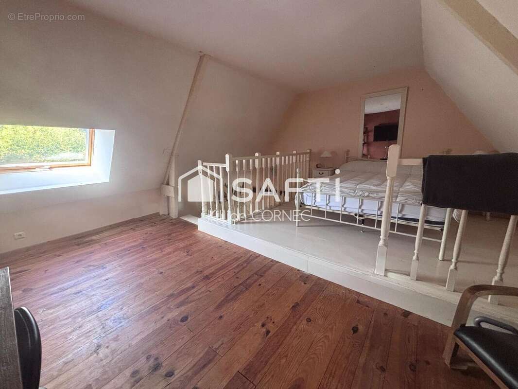 Maison 104 m² à Baud  - photo 7