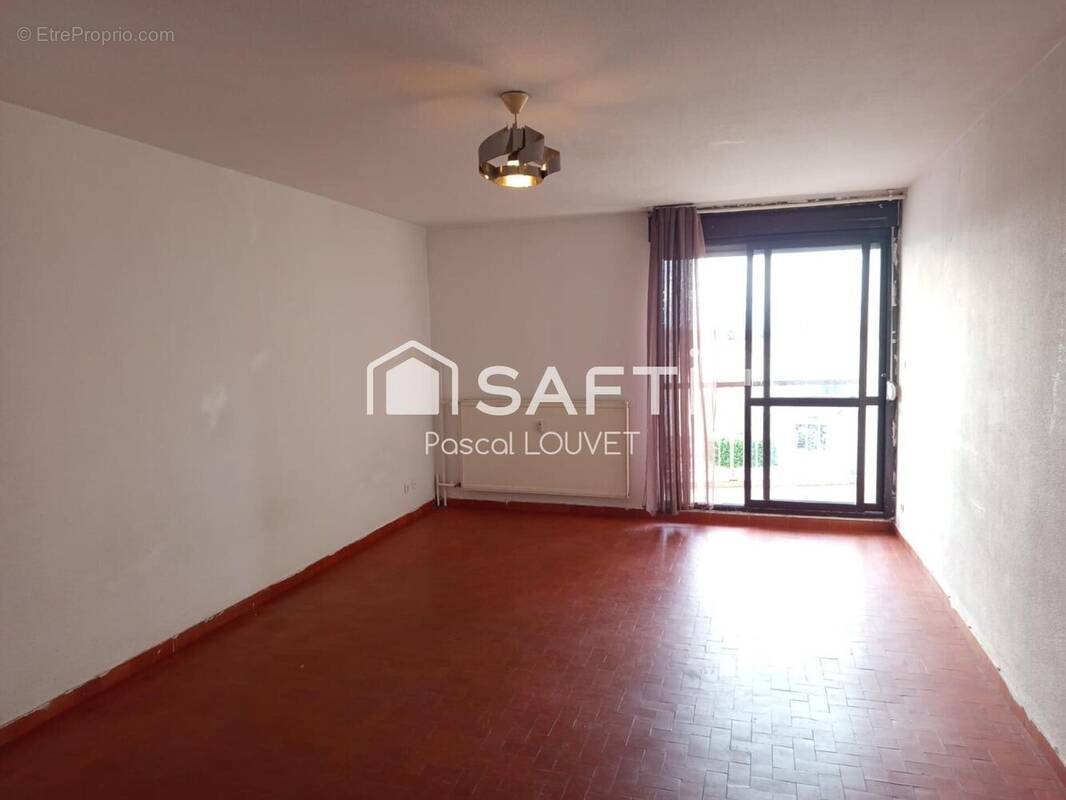 Photo 1 - Appartement à SAINT-MARTIN-DE-CRAU
