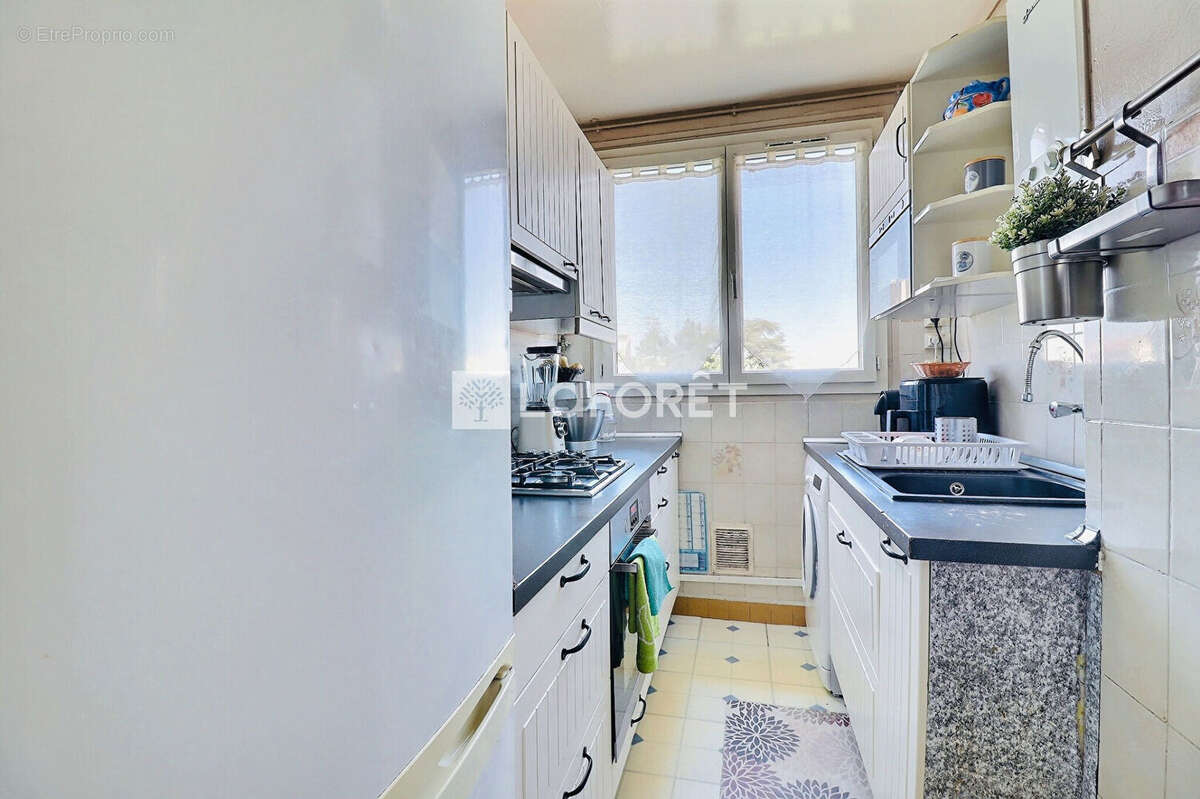 Appartement St Ouen 4 pièce(s) 58 m2 - photo 4