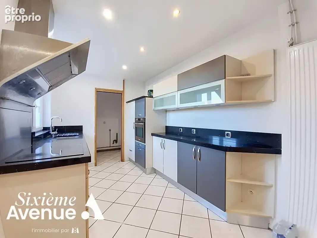 Immeuble avec local commercial et appartement 4 chambres - photo 2