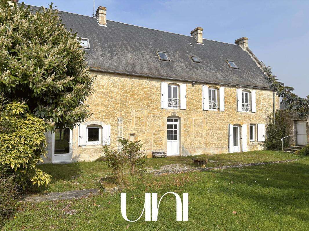 Maison à MEZIDON-CANON