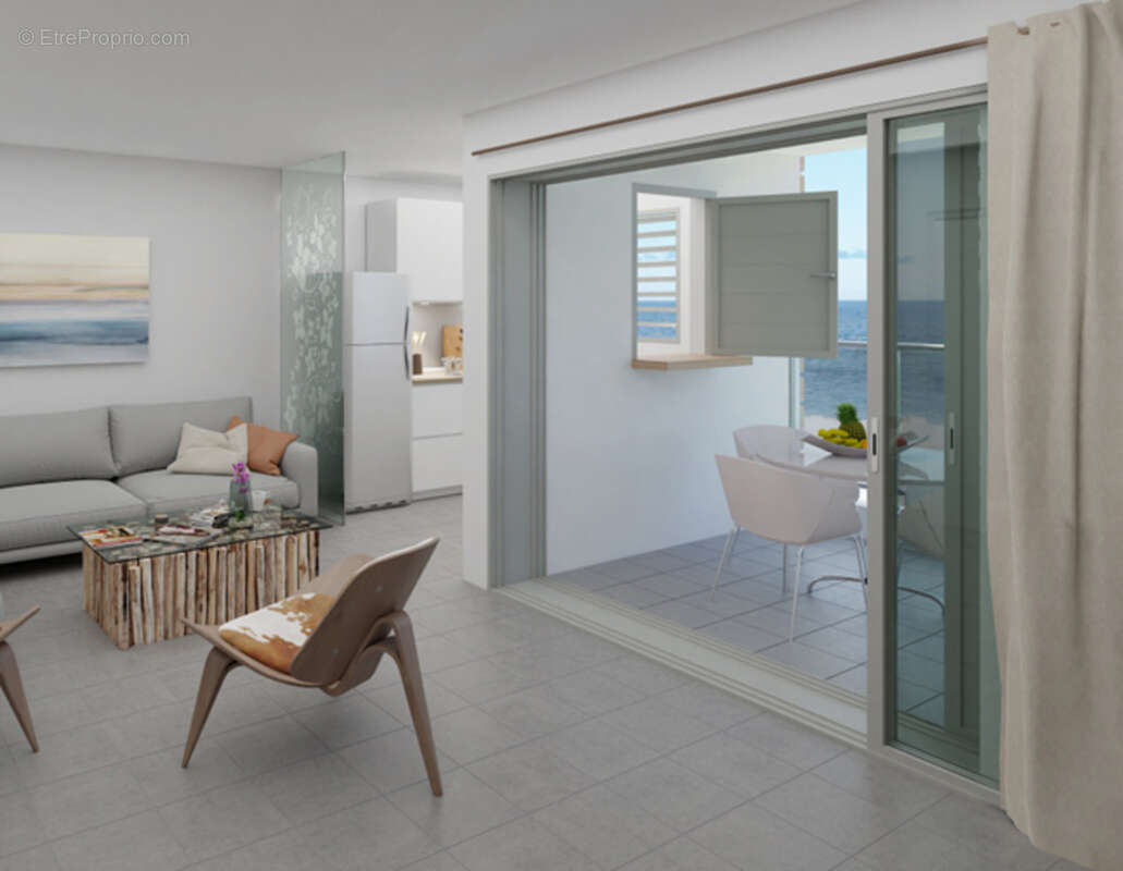 A VENDRE appartement T3 face piscine et face mer en RDC à Moule - photo 2