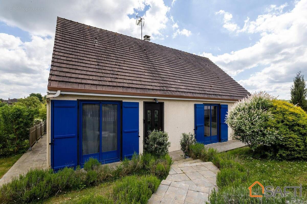 Photo 1 - Maison à BRETEUIL