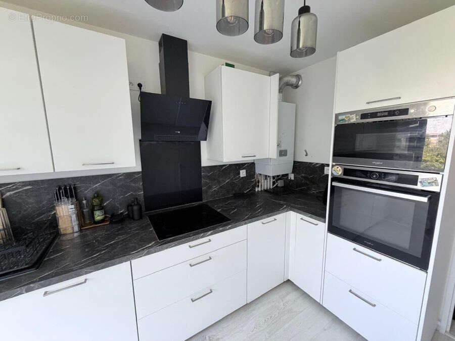 Duplex - Secteur du Plateau - 102m² - photo 4