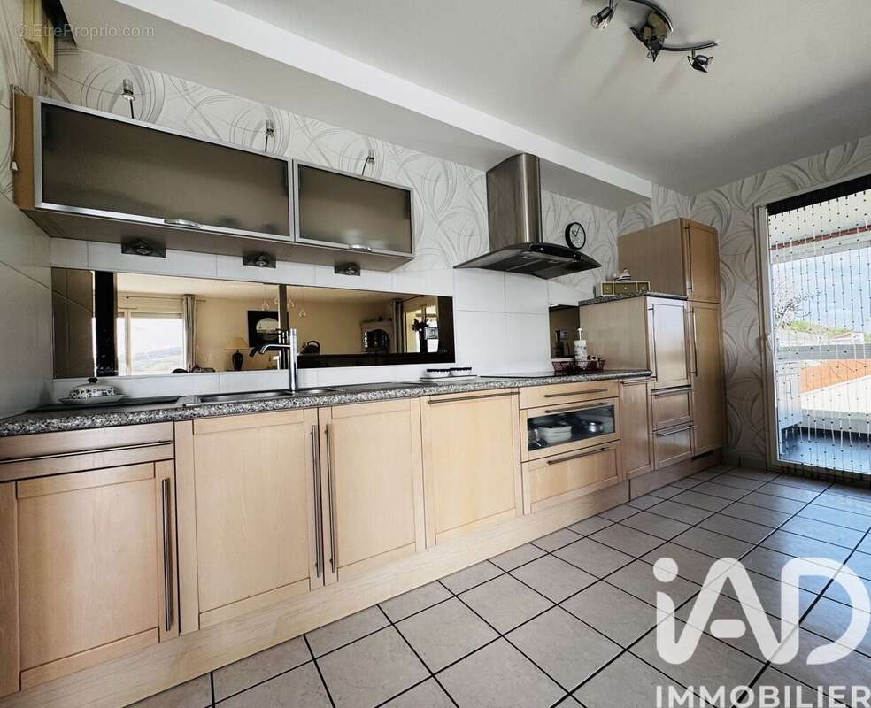 Photo 8 - Appartement à SAINT-PRIEST-EN-JAREZ