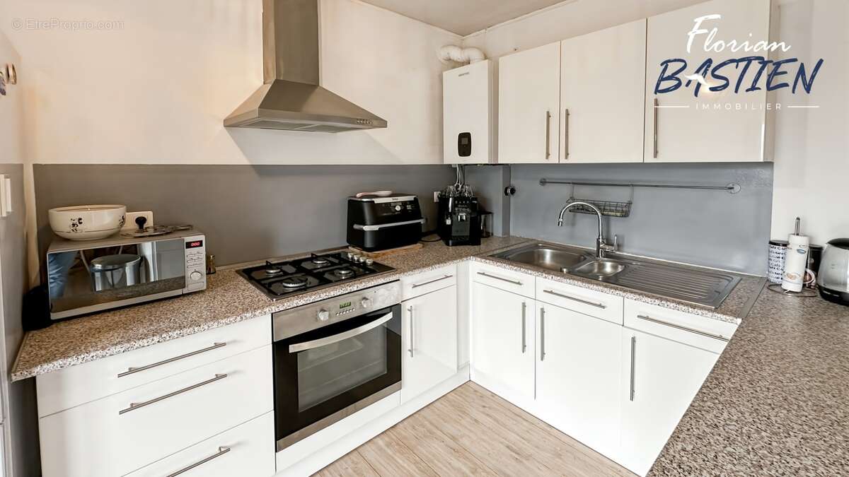 Immeuble en centre-ville – 3 lots – 27 000€/an - photo 3