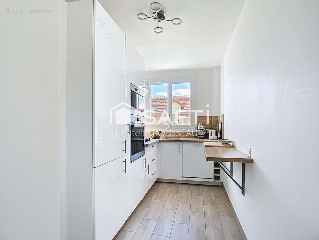 Photo 3 - Appartement à SAINT-MAUR-DES-FOSSES