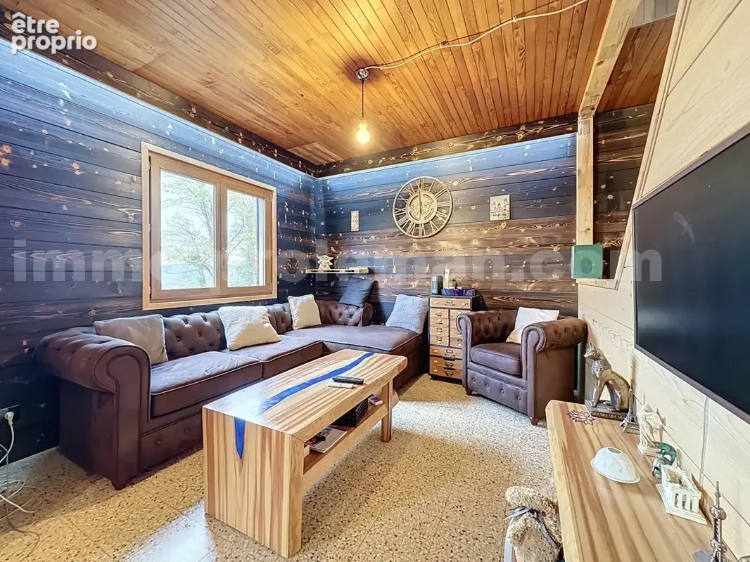 Chalet_individuelle_Machilly_calme_frontiere_suisse_geneve_salon_sejour_cuisine_terrain_terrasse_jardin
