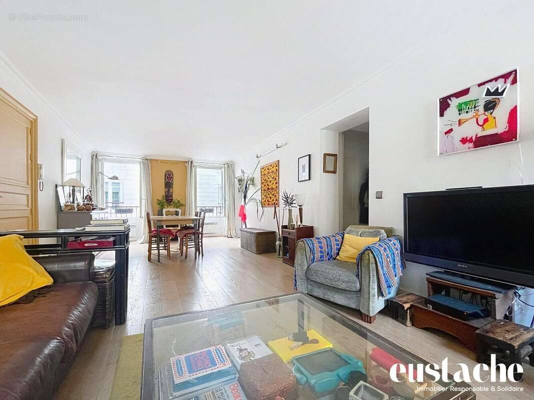 Appartement 80 m² à Paris-9e  - photo 2