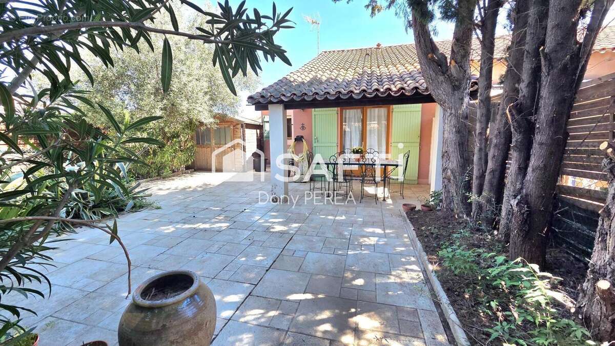 Photo 2 - Maison à SAINT-LAURENT-D'AIGOUZE