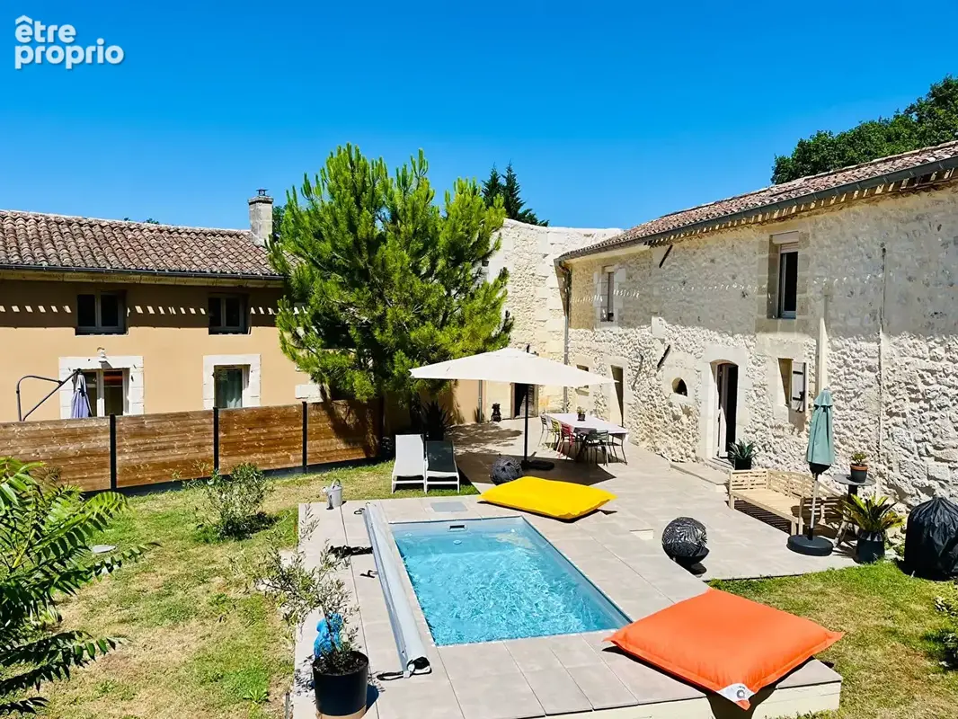VILLEGOUGE Maison en pierre, beaux volumes, piscine et logement attenant - photo 11
