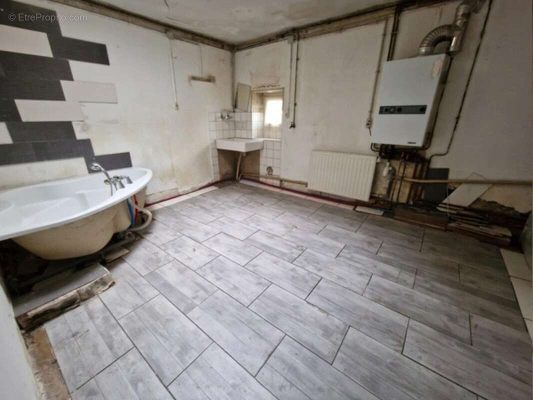 Maison à vendre 5 pièces vittel (88) avec cave, terrasse couverte, atelier, terrain - photo 8