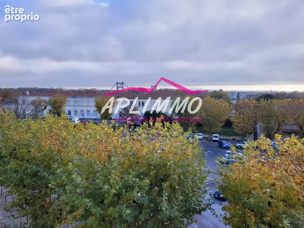 IMMEUBLE devant parking - photo 2
