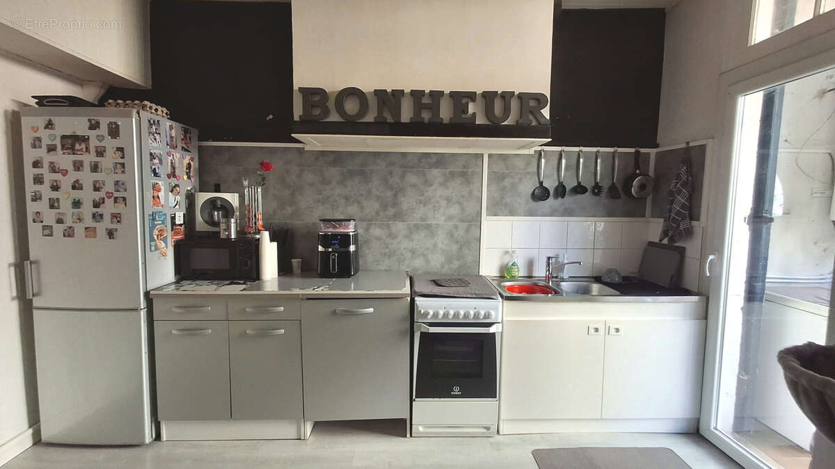Appartement T3 avec cour privative - photo 3