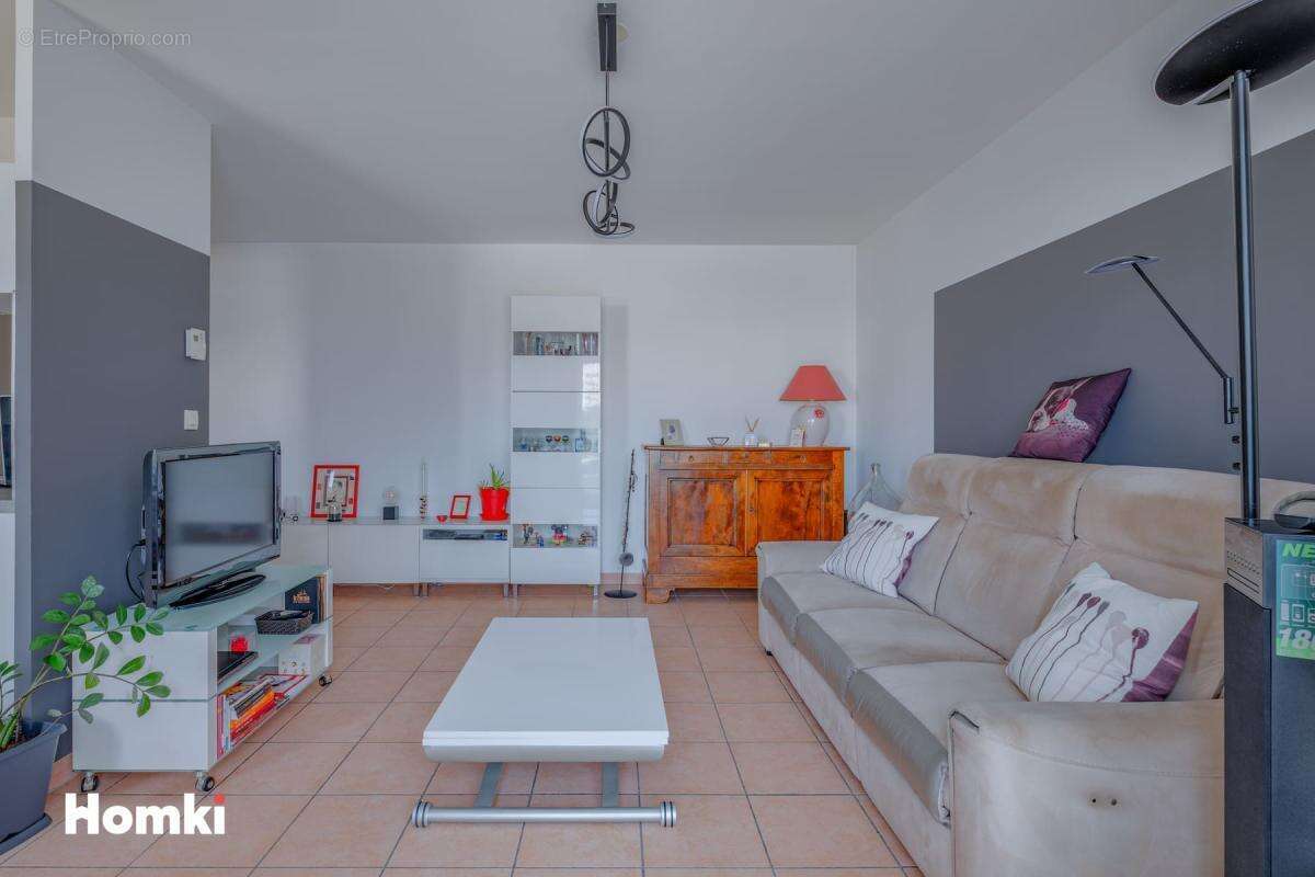 VÉNISSIEUX – T3 lumineux avec terrasse, cave et garage en supplément - photo 2