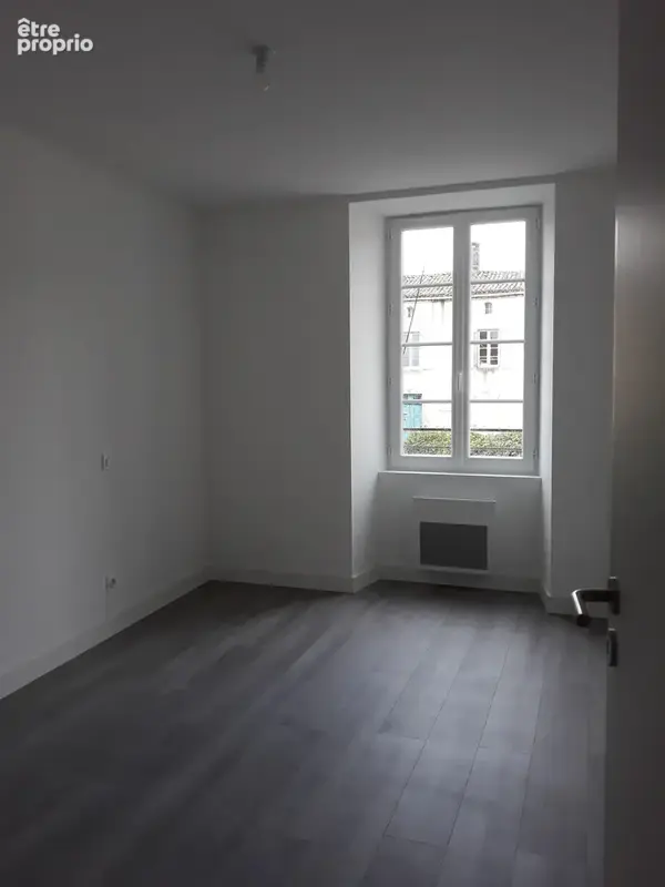 Immeuble de 3 appartements en centre bourg - photo 7