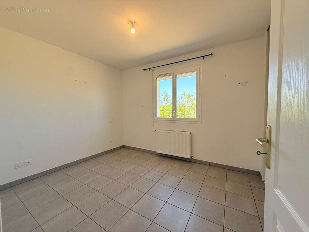 Maison 90m² à saint-denis-de-pile - photo 9