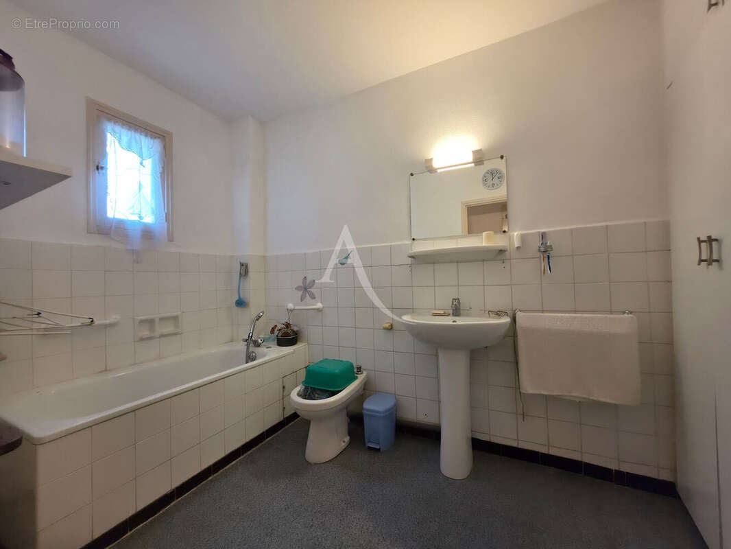 Appartement 87 m² - 3 chambres - Terrasse et cellier et parking - photo 12
