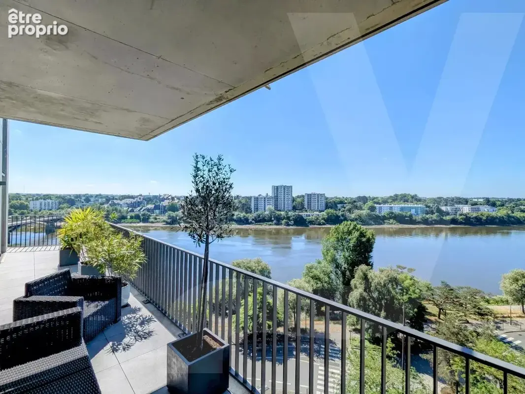 ÎLE DE NANTES – Appartement T5 avec terrasse et vue panoramique sur la Loire - photo 3