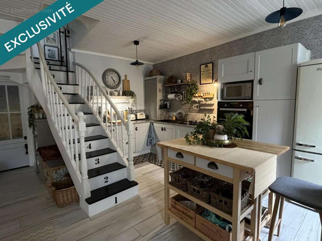 Photo 2 - Maison à PLOUNEVEZ-MOEDEC