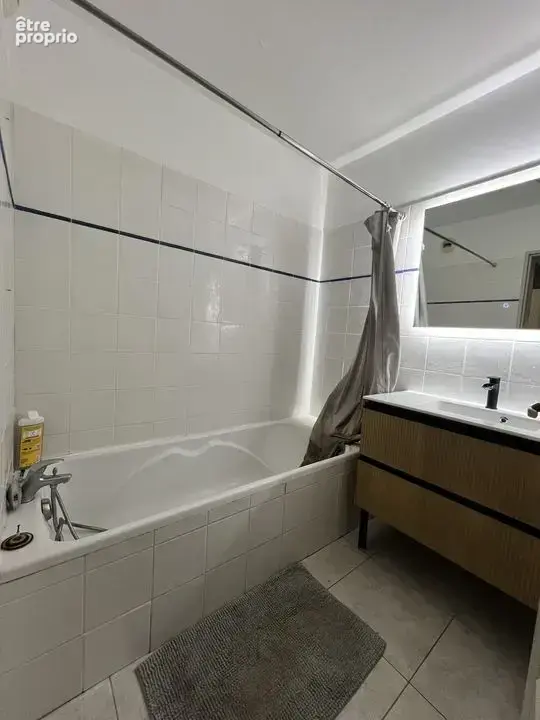 Appartement T3 65.88m² en rez de jardin avec stationnement - photo 7