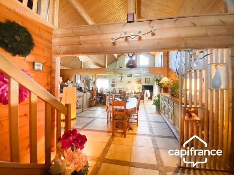 01300 cuzieu maison bois massif type chalet, 146 m² ,plain-pied terrasse, garage,piscine, terrain 1100 m2 - photo 2