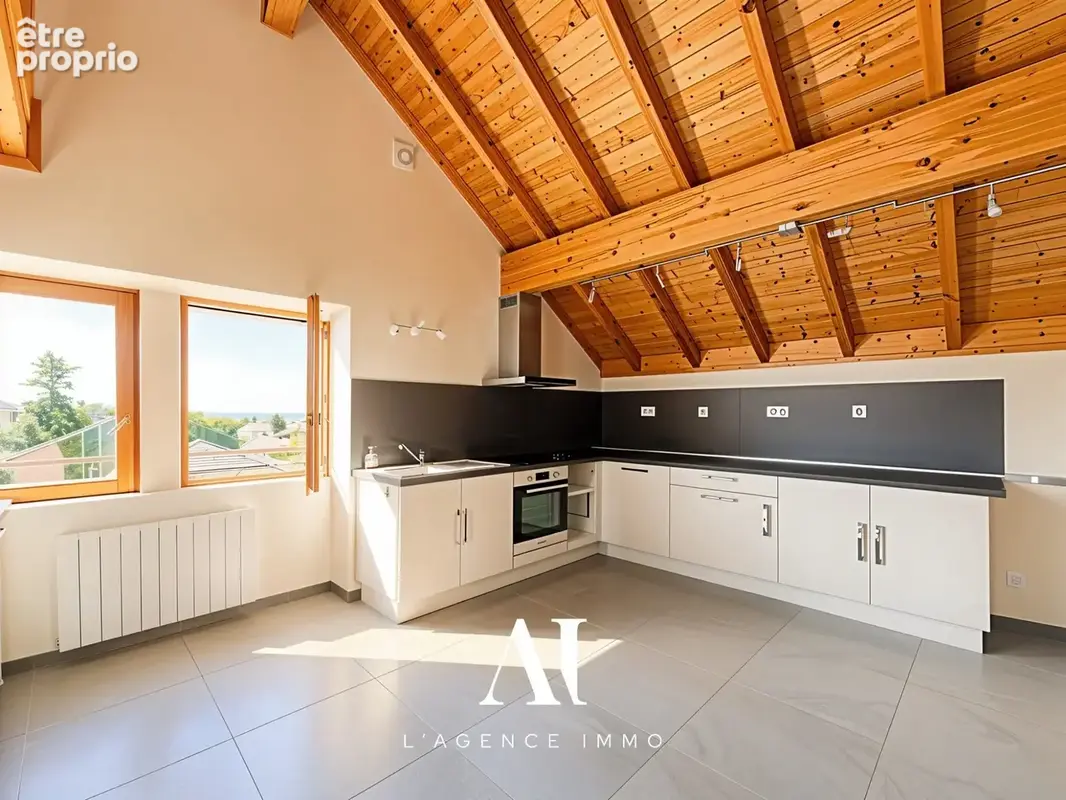 Appartement 4 pièces 85 m² à vendre à Thoiry (01710) - photo 6