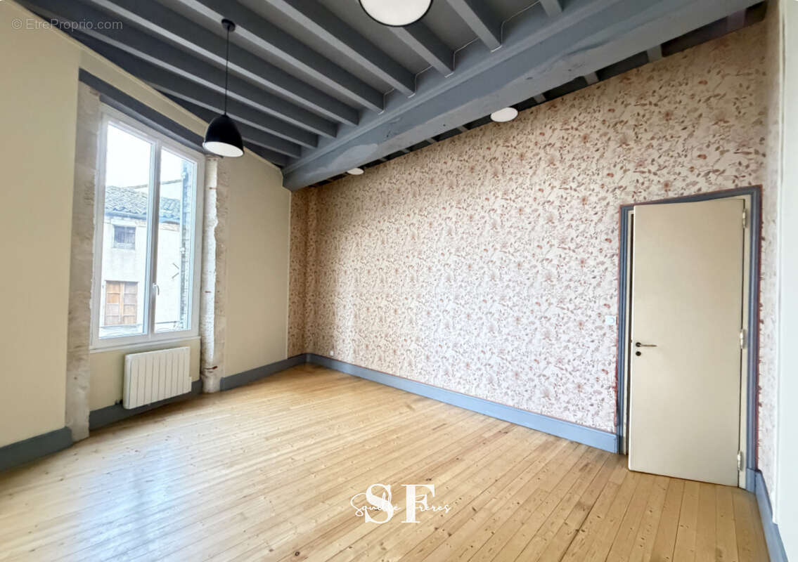 Rive gauche, immeuble de caractere appartement et local commercial - photo 8