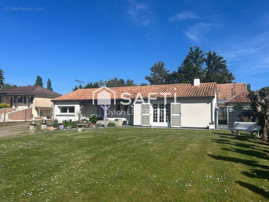 Photo 1 - Maison à THURE