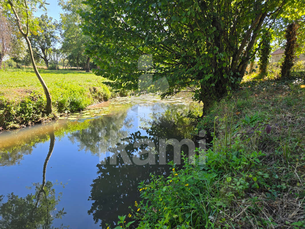 Magnifique longère 184m2 sur terrain arboré de 2761m2 en bord de rivière - photo 19