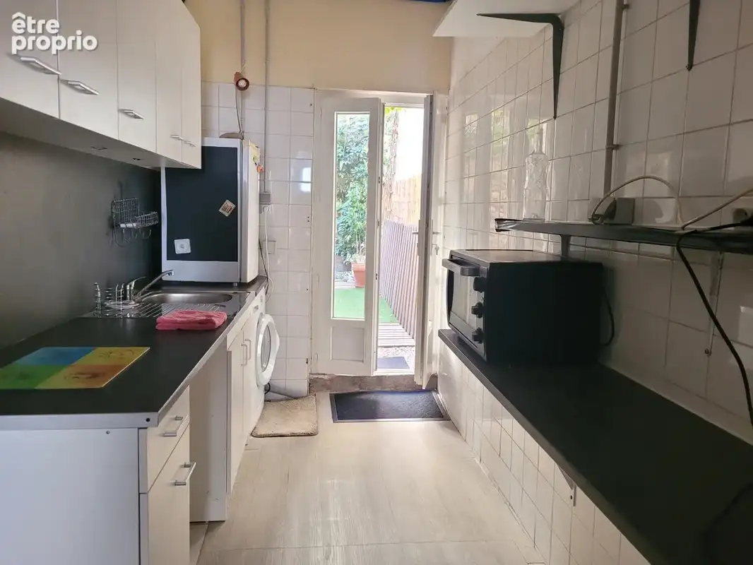 Charmant appartement de caractère avec cour et sa cuisine d'été. - photo 16