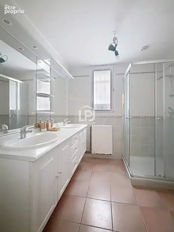Appartement T2 bis de 90 m², calme absolu à quelques pas du centre-ville, grand garage - photo 6