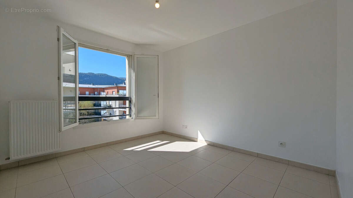 SEYNOD - T3 avec balcon - photo 8