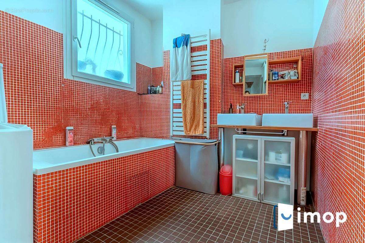 Duplex de 122m² à 2 min du Métro 13 Porte de Paris à très faibles charges - photo 9