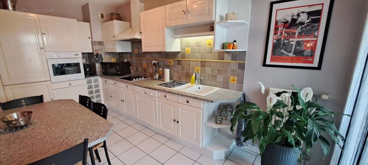 ECHIROLLES - T4 de 83 m2, poss de garage - photo 3