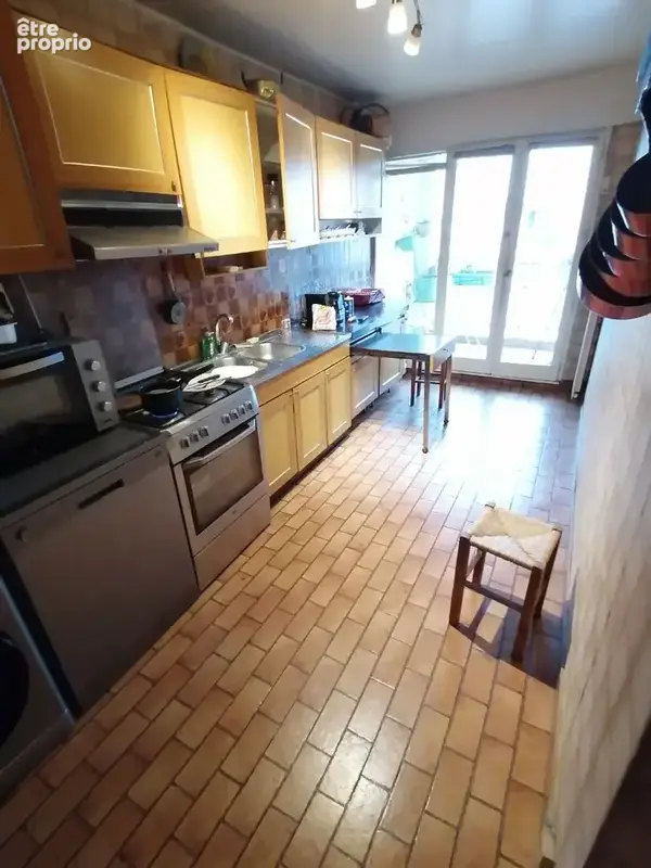 Appartement 4 pieces avec cave et parking - photo 4