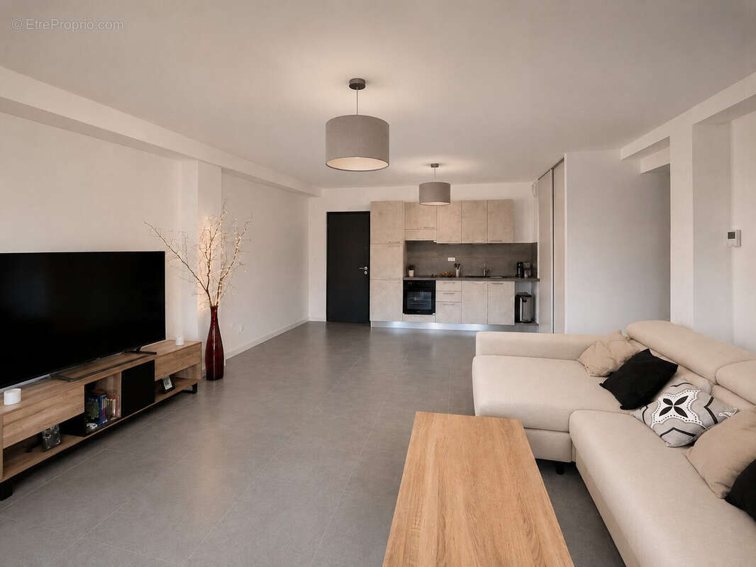 CUISINE/SALON - Appartement à SAINT-PIERRE-EN-FAUCIGNY
