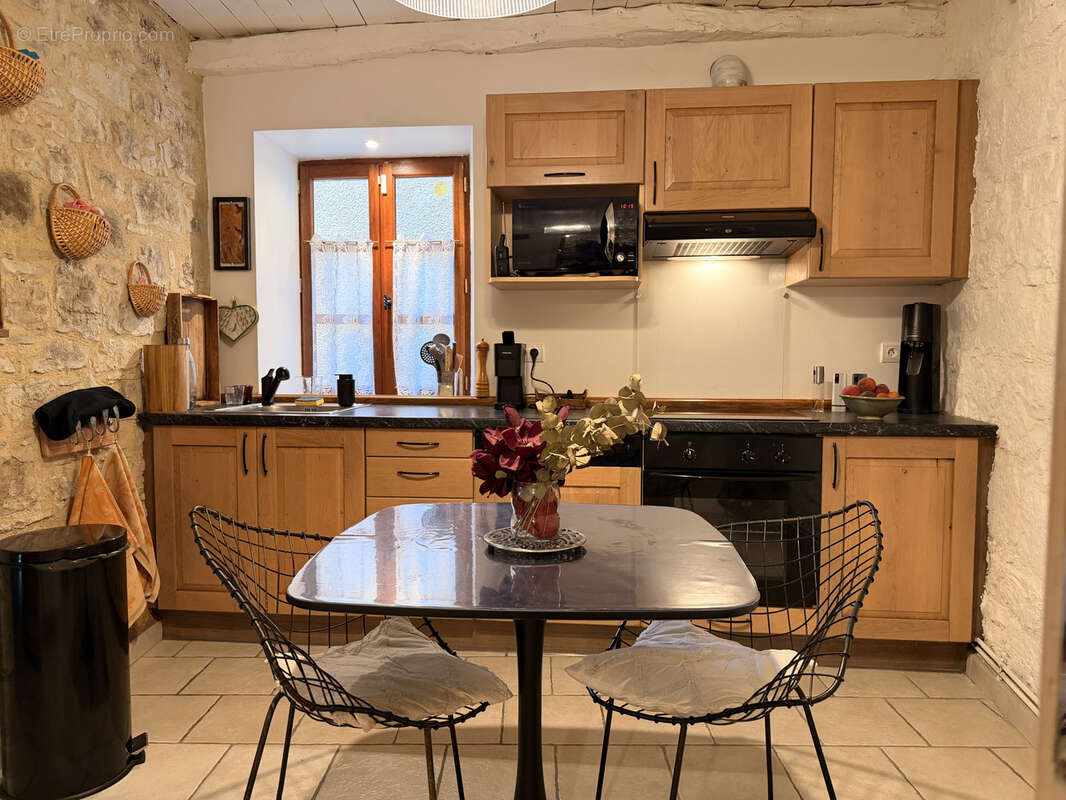 Maison en pierre avec cour au centre de Cajarc - photo 7