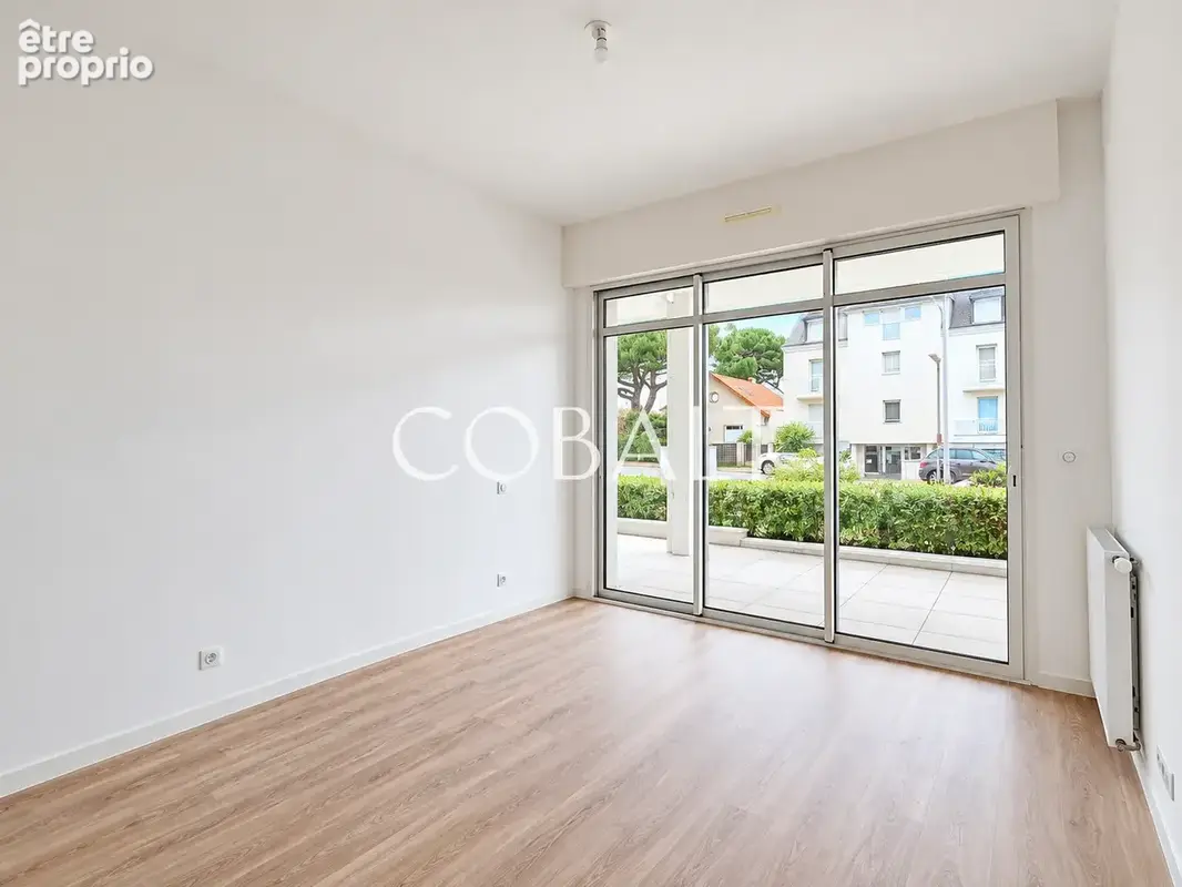Appartement - 98 m2 - 3 chambres - Rez-de-jardin - double garage - Secteur Bonne Source - photo 4