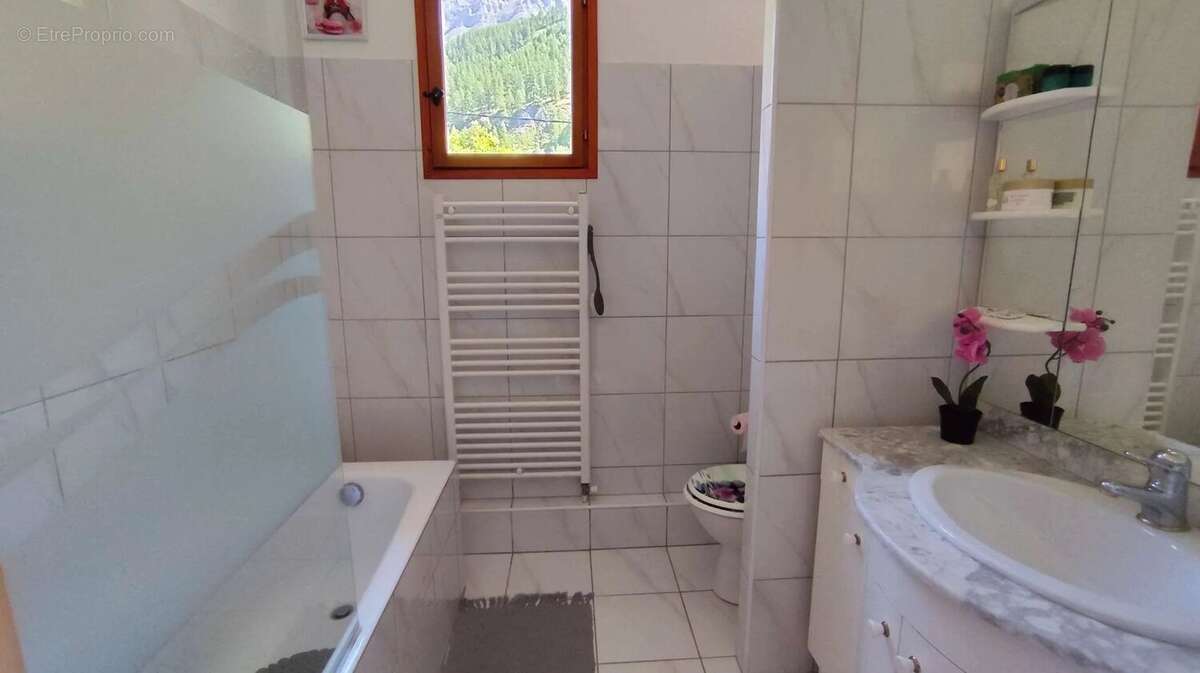 Maison 5 pièces  98 m² - garage - photo 12