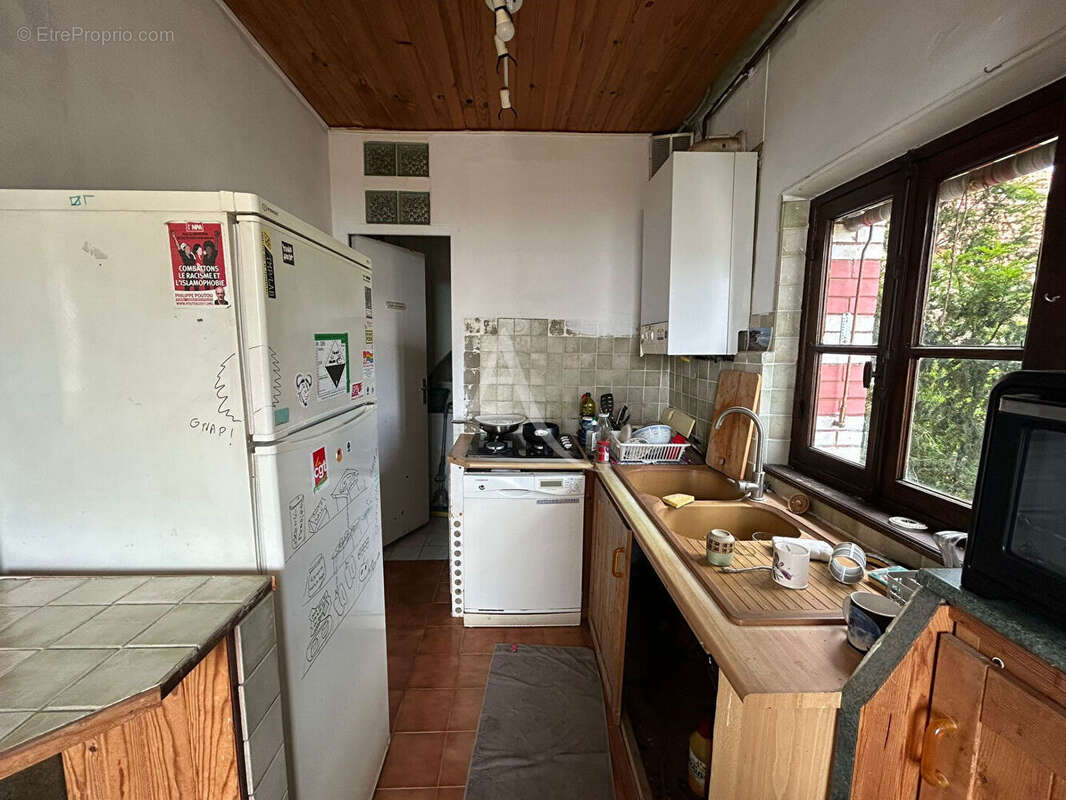 Appartement avec 2 caves et une dependance - photo 2