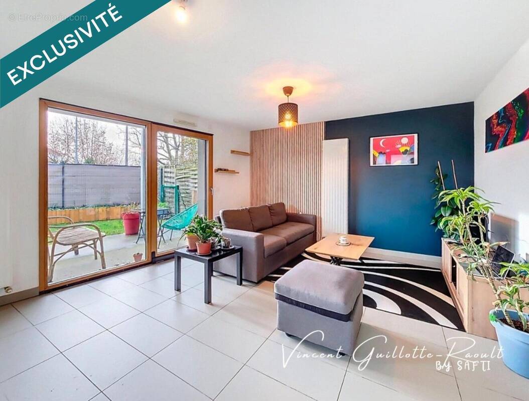 Photo 1 - Appartement à BOUGUENAIS