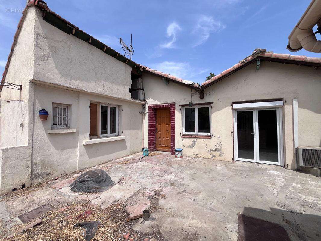 Maison de plain-pied de 95 m² environs avec travaux à prévoir sur un terrain de 509 m² proche de l'aéroport - photo 4